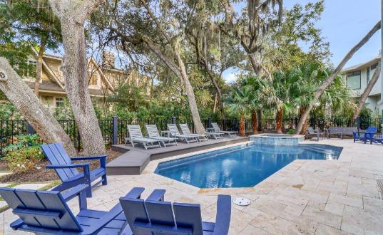 home with a pool at night